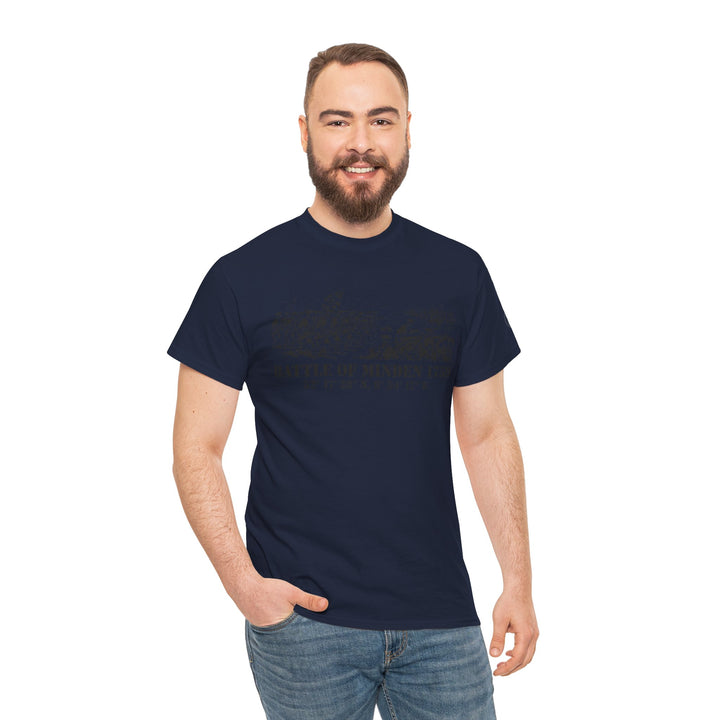 Navy blue t-shirt by S&amp;W Gallus with a historical battle graphic on the chest, worn by a smiling man with a beard.