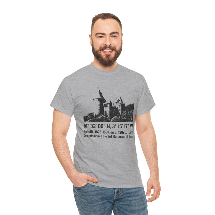Heather gray t-shirt by S&amp;W Gallus, featuring a Welsh castle illustration with coordinates and historical details, worn with jeans.