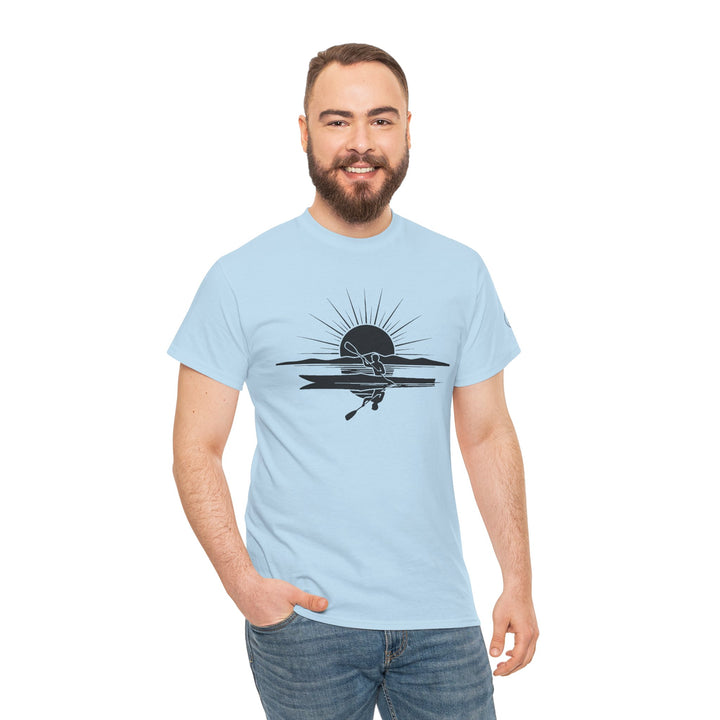 Light blue Kayak Sunset T-Shirt by S&amp;W Gallus, featuring a black kayak design, worn with blue jeans.
