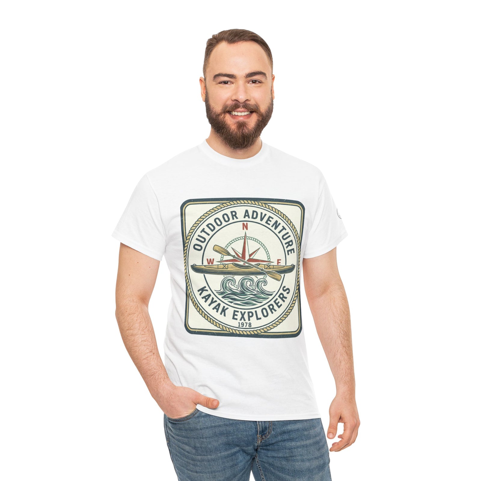 White Kayak Explorers T-shirt by S&W Gallus featuring a compass and kayak logo, worn with blue jeans.