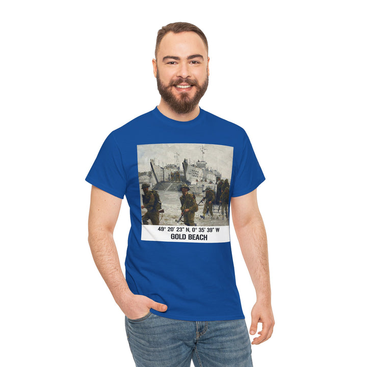 Blue t-shirt by Veteran owned, featuring a vintage-style print of soldiers at Gold Beach with coordinate details. The model wears light wash jeans.
