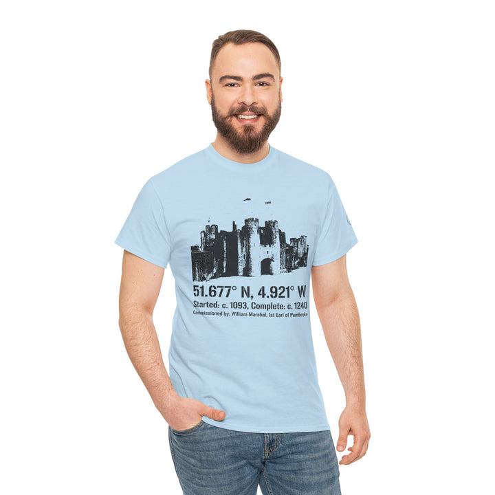 Light blue t-shirt with a castle graphic by S&amp;W Gallus, worn with jeans by a smiling man.