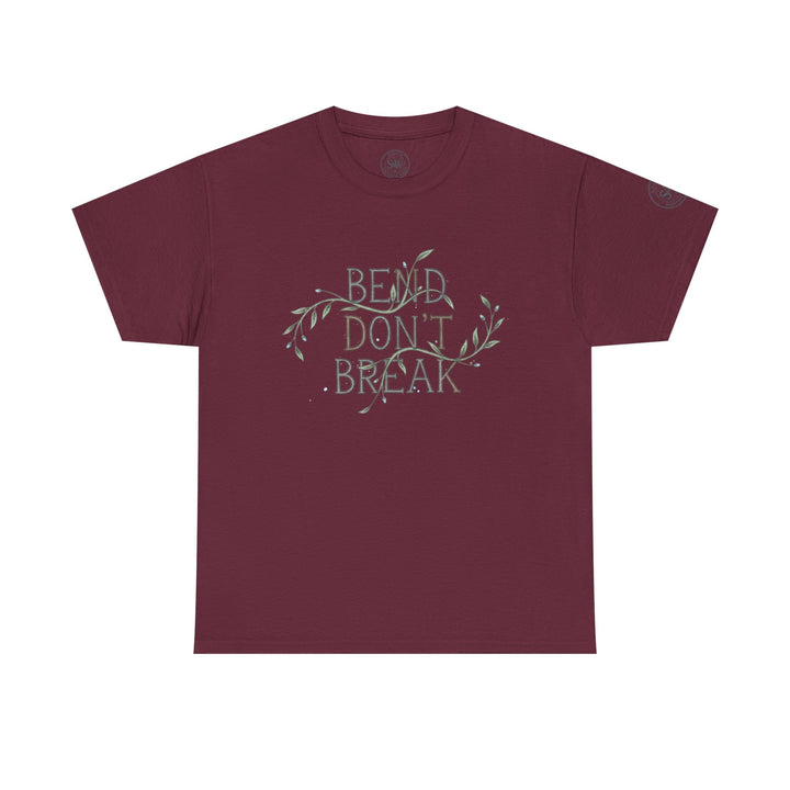Maroon t-shirt with graphic text by S&amp;W Gallus, featuring decorative floral elements around the quote.
