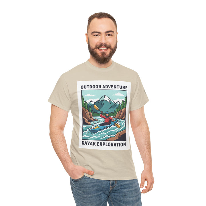 Sand-colored T-shirt by S&amp;W Gallus, featuring a graphic of a kayaker on a river with mountains in the background.