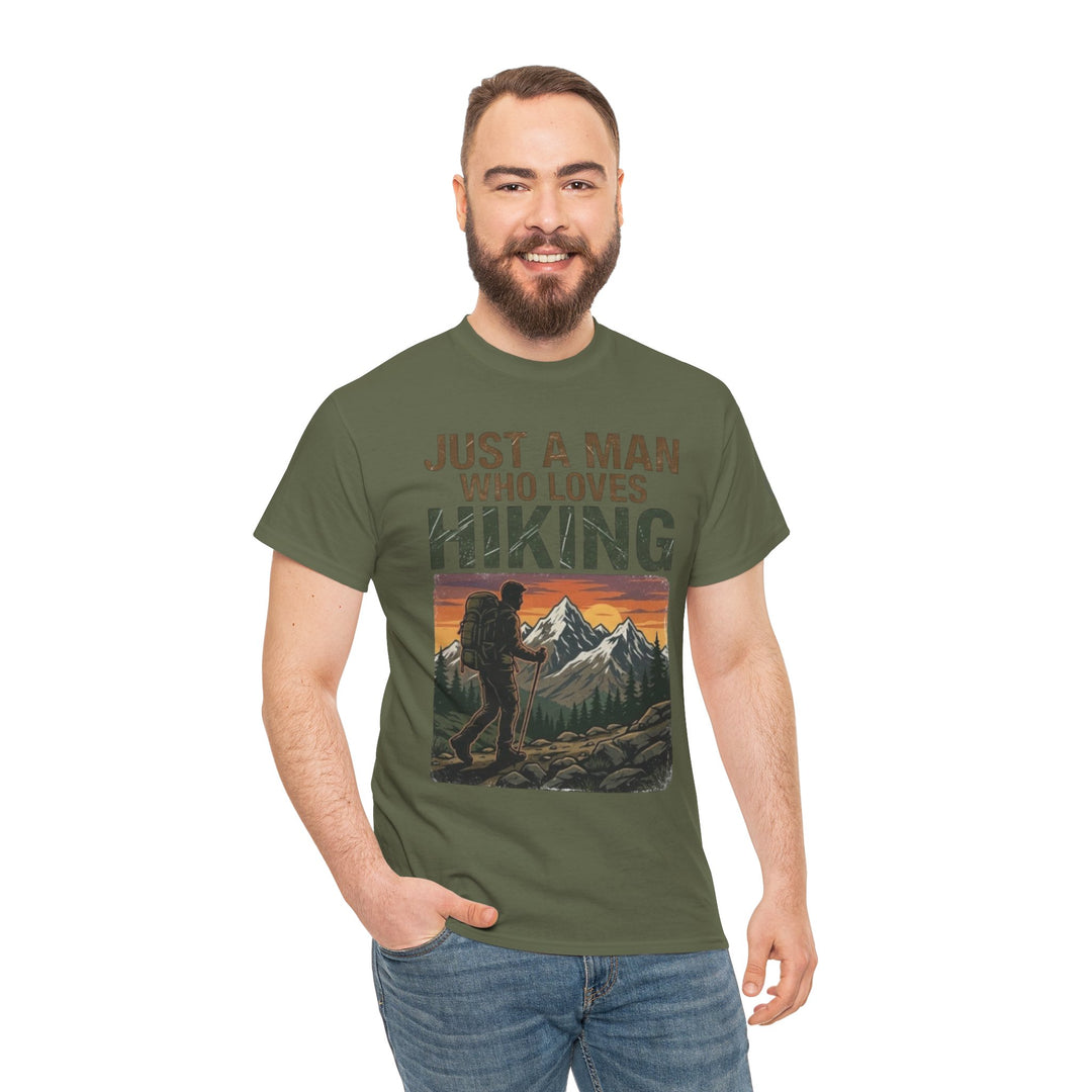 Olive green t-shirt by Veteran owned, featuring a hiking graphic and text on the front, worn with jeans.