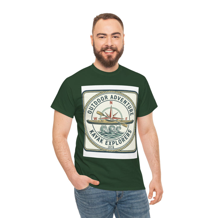 Green Kayak Explorers T-shirt by S&amp;W Gallus, featuring an adventure logo with compass and rope border, worn with jeans.