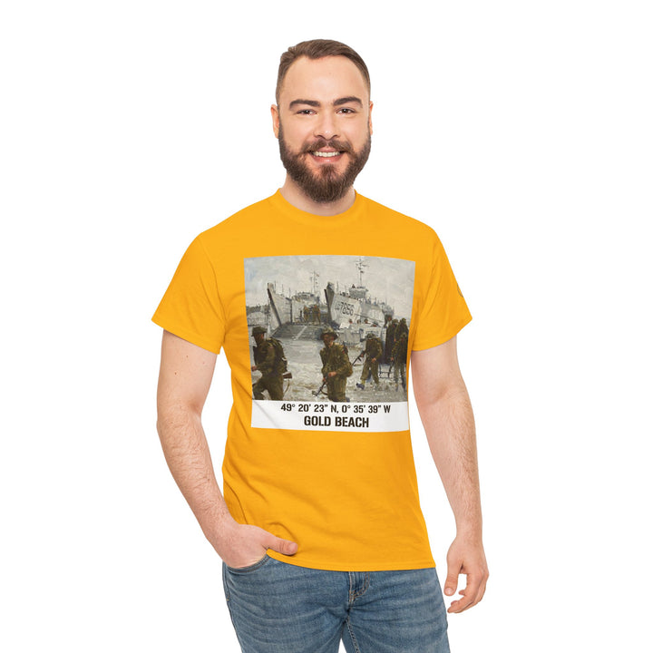 Gold t-shirt by Veteran owned, featuring a "Gold Beach" graphic with coordinates, worn with jeans on a white background.