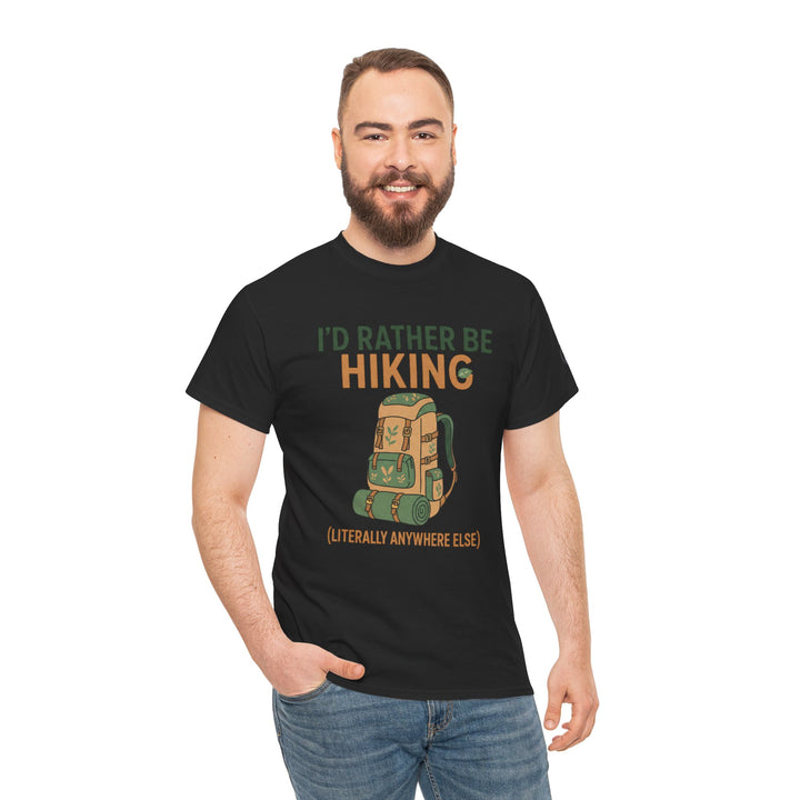 Black graphic T-shirt by S&amp;W Gallus featuring a hiking-themed print, worn with blue jeans on a white background.