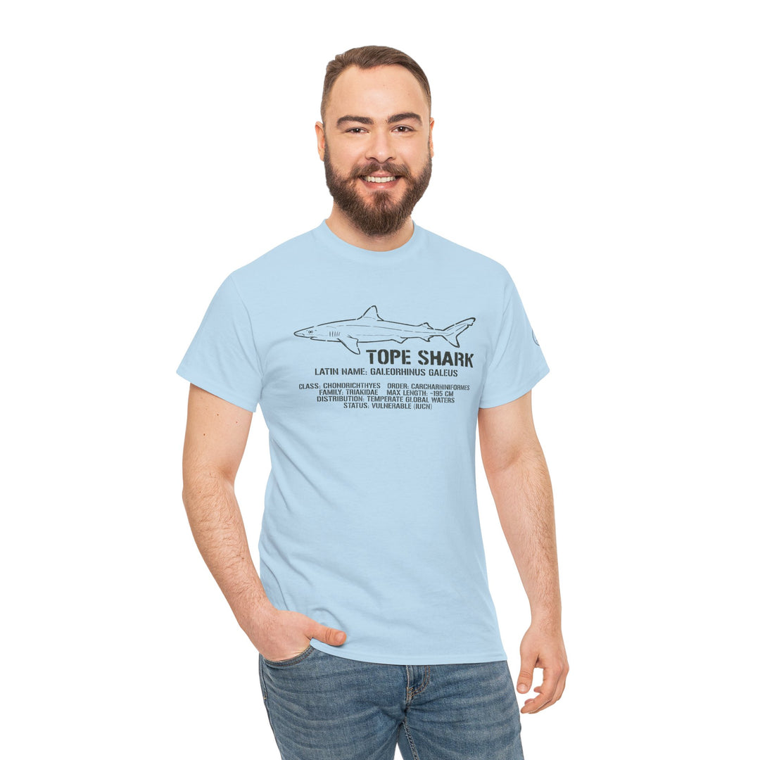 Light blue Tope Shark T-shirt by S&amp;W Gallus, featuring a shark illustration and text, worn with jeans.