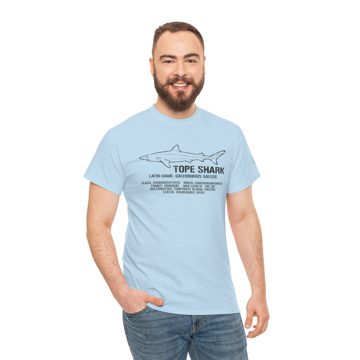 Light blue Tope Shark T-shirt by S&amp;W Gallus, featuring a shark illustration and text, worn with jeans.