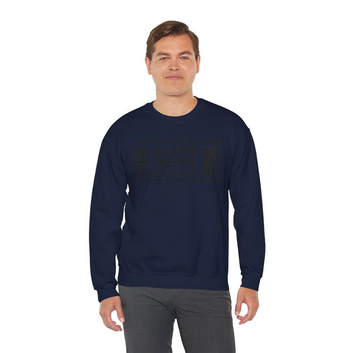Navy blue crewneck sweatshirt by S&amp;W Gallus with the text "Allies in Defense United for Freedom" in a rectangular frame.
