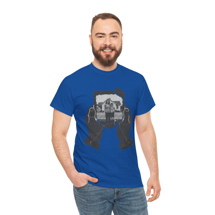 Blue tee shirt by S&amp;W Gallus featuring a photo graphic held by cracked hands, worn with blue jeans.