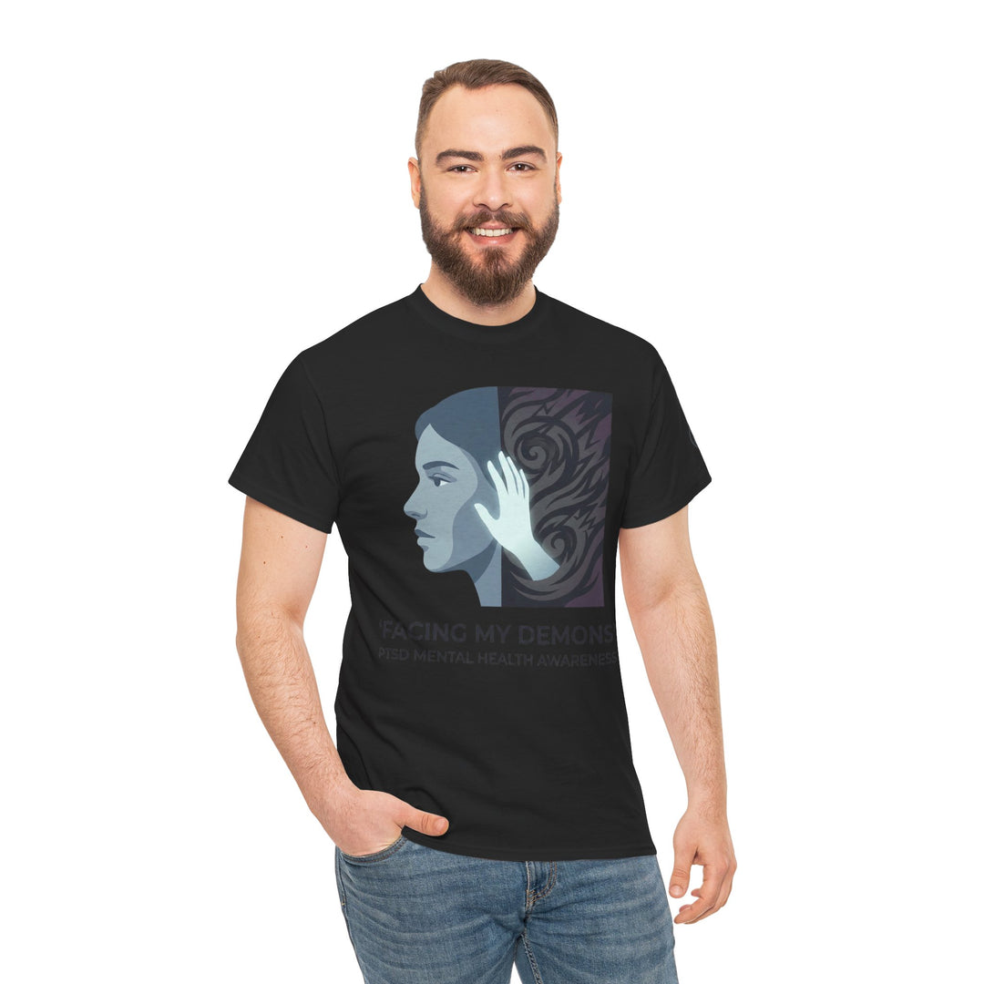 Black t-shirt with a graphic design by Veteran owned, worn with blue jeans and a hand in the pocket.