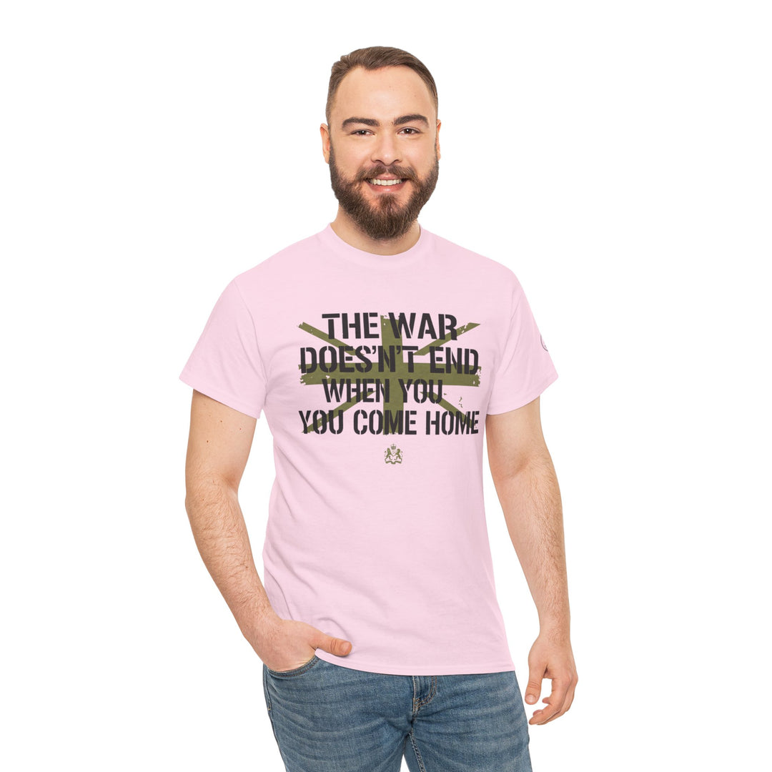 Pink graphic tee by S&amp;W Gallus, featuring a war slogan with crossed military designs, styled with jeans.