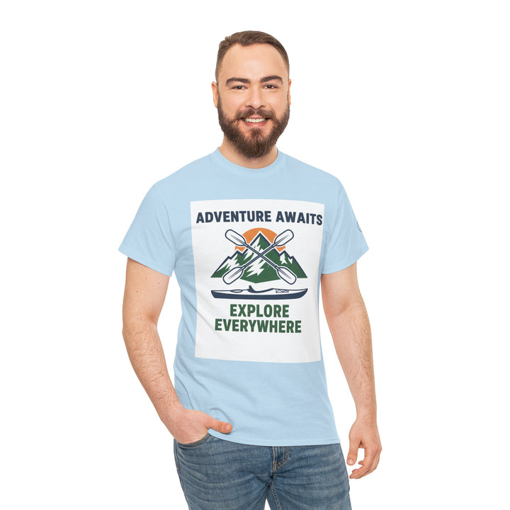 Light blue T-shirt by S&amp;W Gallus, featuring a graphic design of mountains, paddles, and a kayak.