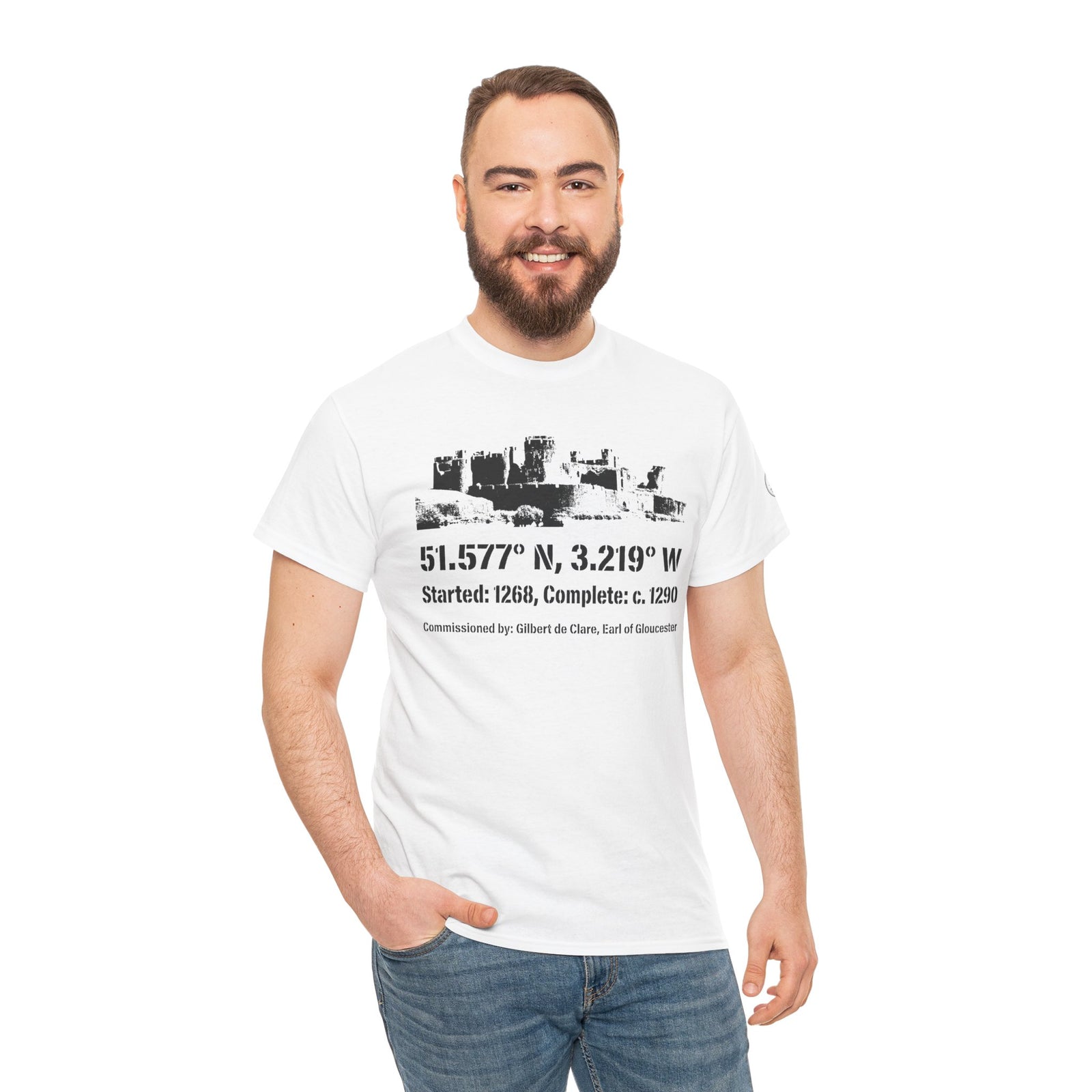 Caerphilly Castle T-shirt by S&W Gallus, featuring a landmark graphic with historical facts, worn with jeans.