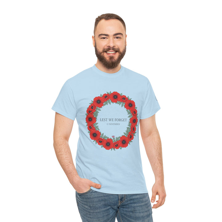 Light blue Remembrance T-shirt by S&amp;W Gallus, featuring a wreath of red poppies with "Lest We Forget" text.