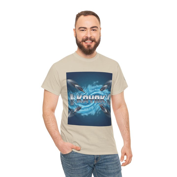 Tan T-shirt with "Kayak" graphic by S&amp;W Gallus, worn with jeans by a smiling bearded man, on white background.
