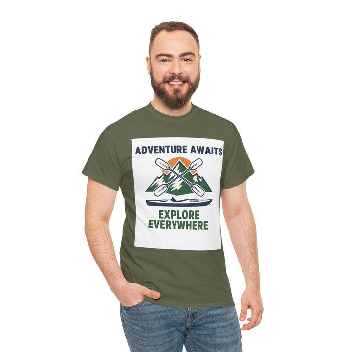 Olive green T-shirt by S&amp;W Gallus, featuring a graphic design of mountains, oars, and a kayak, with the text "Adventure Awaits" and "Explore Everywhere".
