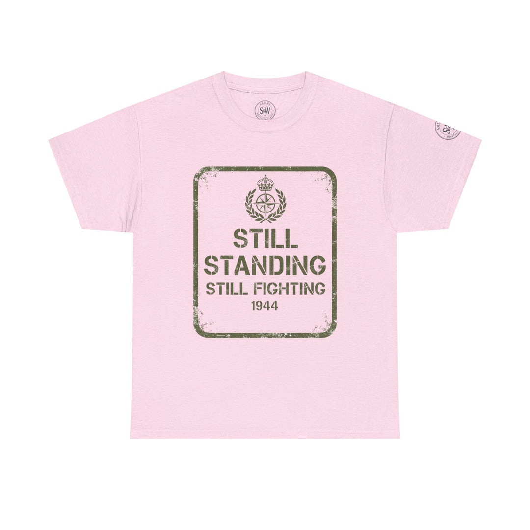 Light pink t-shirt by S&amp;W Gallus with a distressed "Still Standing" graphic in olive green.
