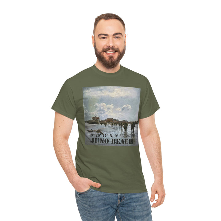Olive green t-shirt with Juno Beach graphic by Veteran owned, worn with blue jeans on a white background.