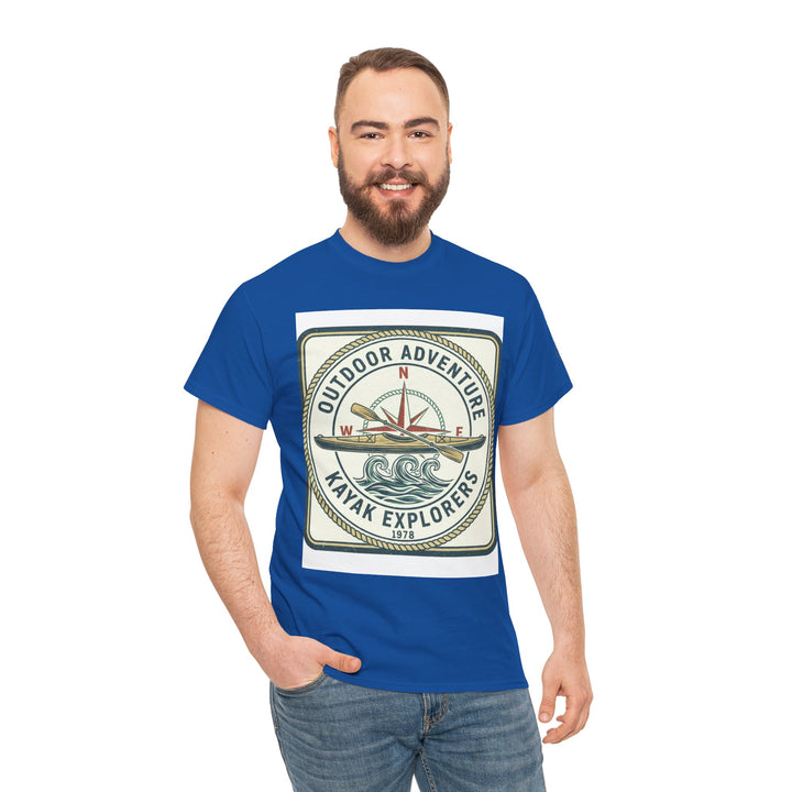 Blue Kayak Explorers T-shirt by S&amp;W Gallus, featuring a graphic design of a kayak and compass on white background, worn with jeans.