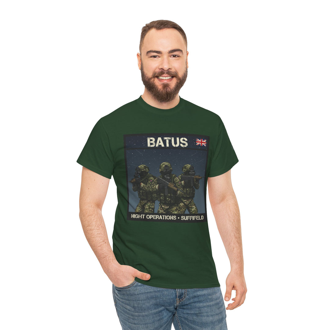 Green graphic t-shirt by S&amp;W Gallus displaying a military-themed design, worn with jeans.