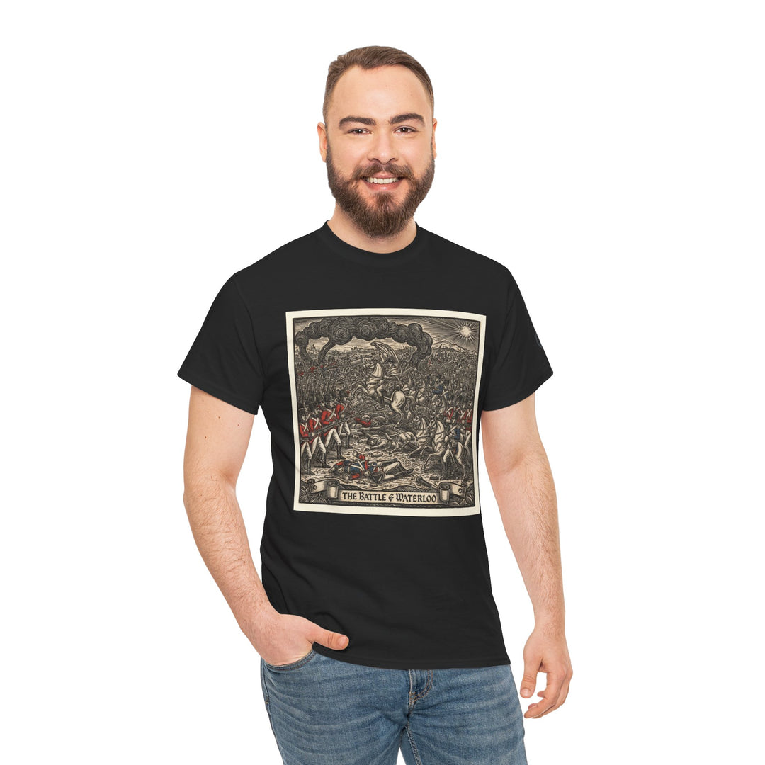 Black graphic T-shirt by S&amp;W Gallus featuring a vintage "Battle of Waterloo" war illustration. Man wearing blue jeans with his hand in his pocket.