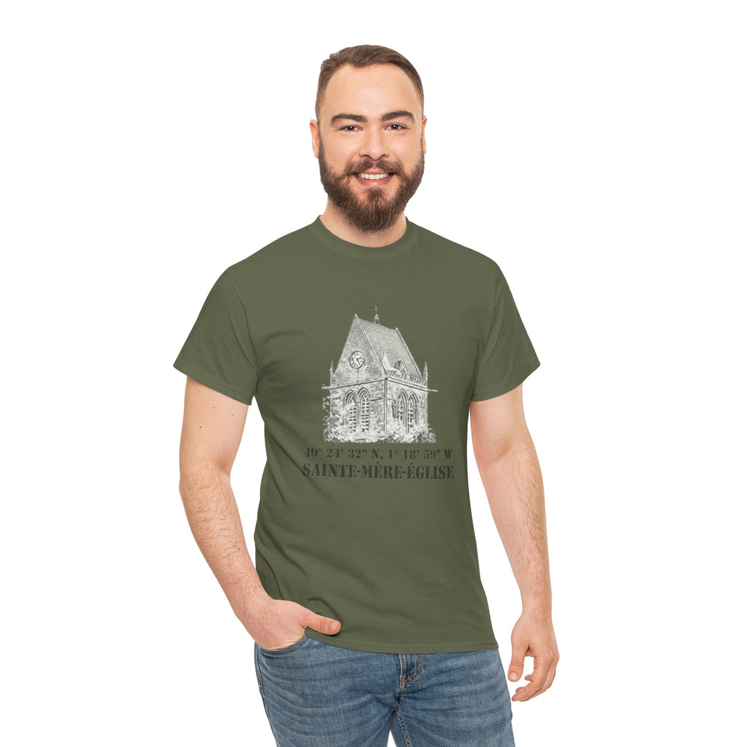 Olive green t-shirt with vintage church graphic by Veteran owned, shown on a smiling model with jeans.