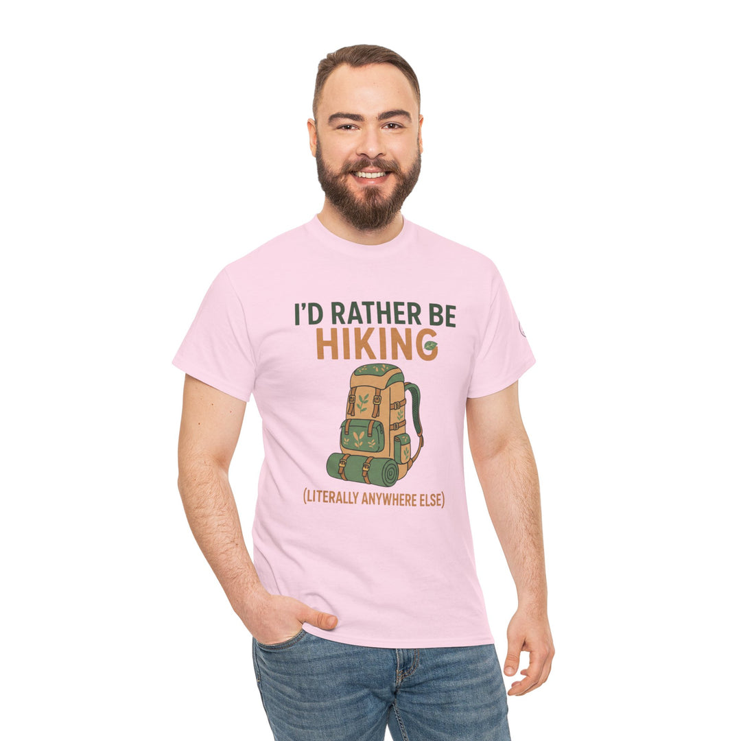 Pink hiking t-shirt by S&amp;W Gallus featuring a hiking pack graphic and humorous text, worn with jeans.