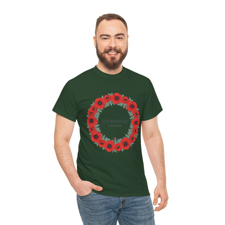 Dark green "Lest We Forget" t-shirt by S&amp;W Gallus, featuring a poppy wreath and styled with casual blue jeans.
