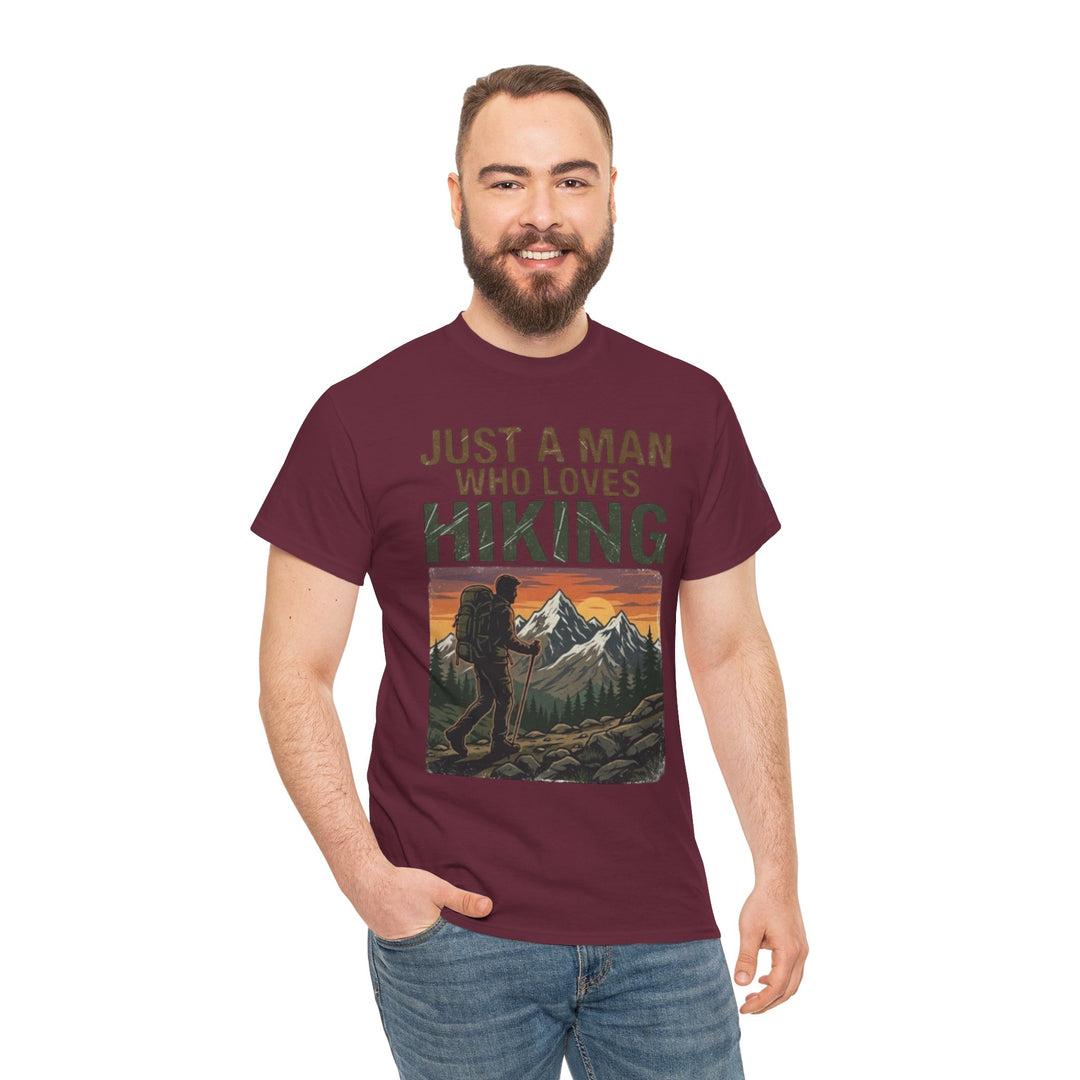 Maroon T-shirt with hiking graphic by Veteran owned, worn with blue jeans and featuring a bearded man.