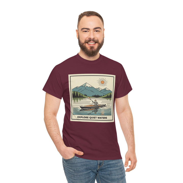 Burgundy T-shirt with graphic by S&amp;W Gallus, featuring mountains, trees, and a person in a kayak, styled with jeans.
