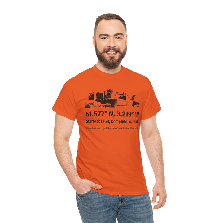 Orange T-shirt by S&amp;W Gallus featuring Caerphilly Castle graphic and geographical coordinates, worn with blue jeans.