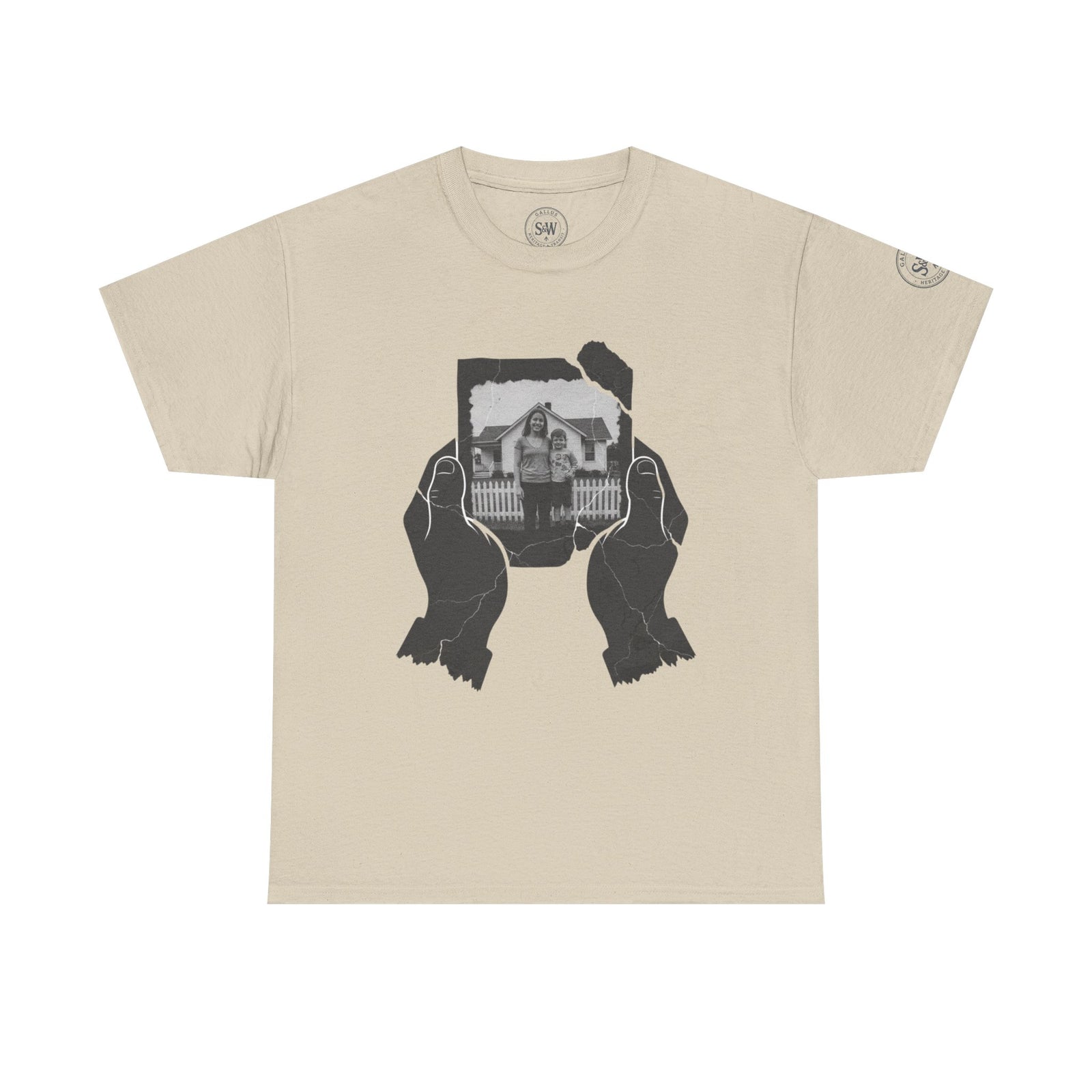 Beige t-shirt by S&W Gallus featuring a graphic print of hands holding a torn photograph.