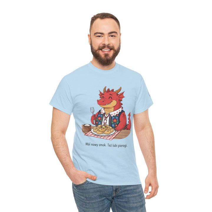 Light blue t-shirt by S&amp;W Gallus, featuring a cartoon dragon eating pierogi and Polish text, worn with blue jeans.