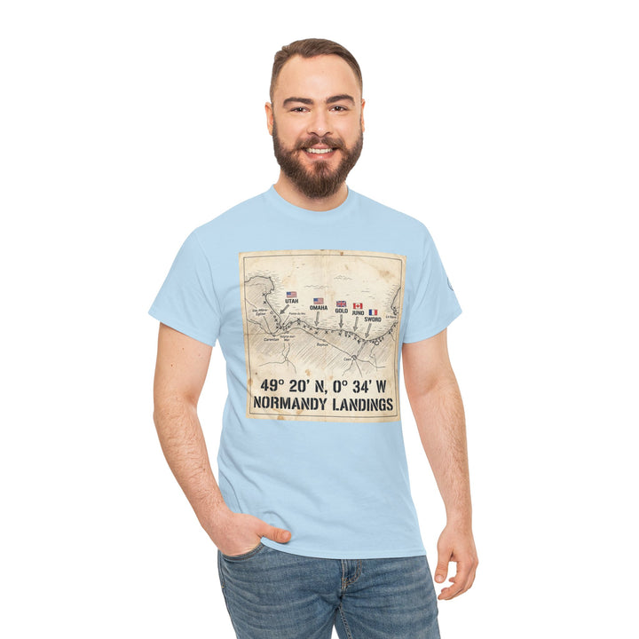 Light blue T-shirt with a Normandy landings map by Veteran owned, paired with blue jeans on a smiling man.