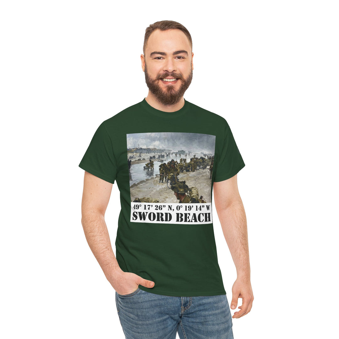 Forest green t-shirt with a Sword Beach graphic by Veteran owned, worn with blue jeans by a smiling man.