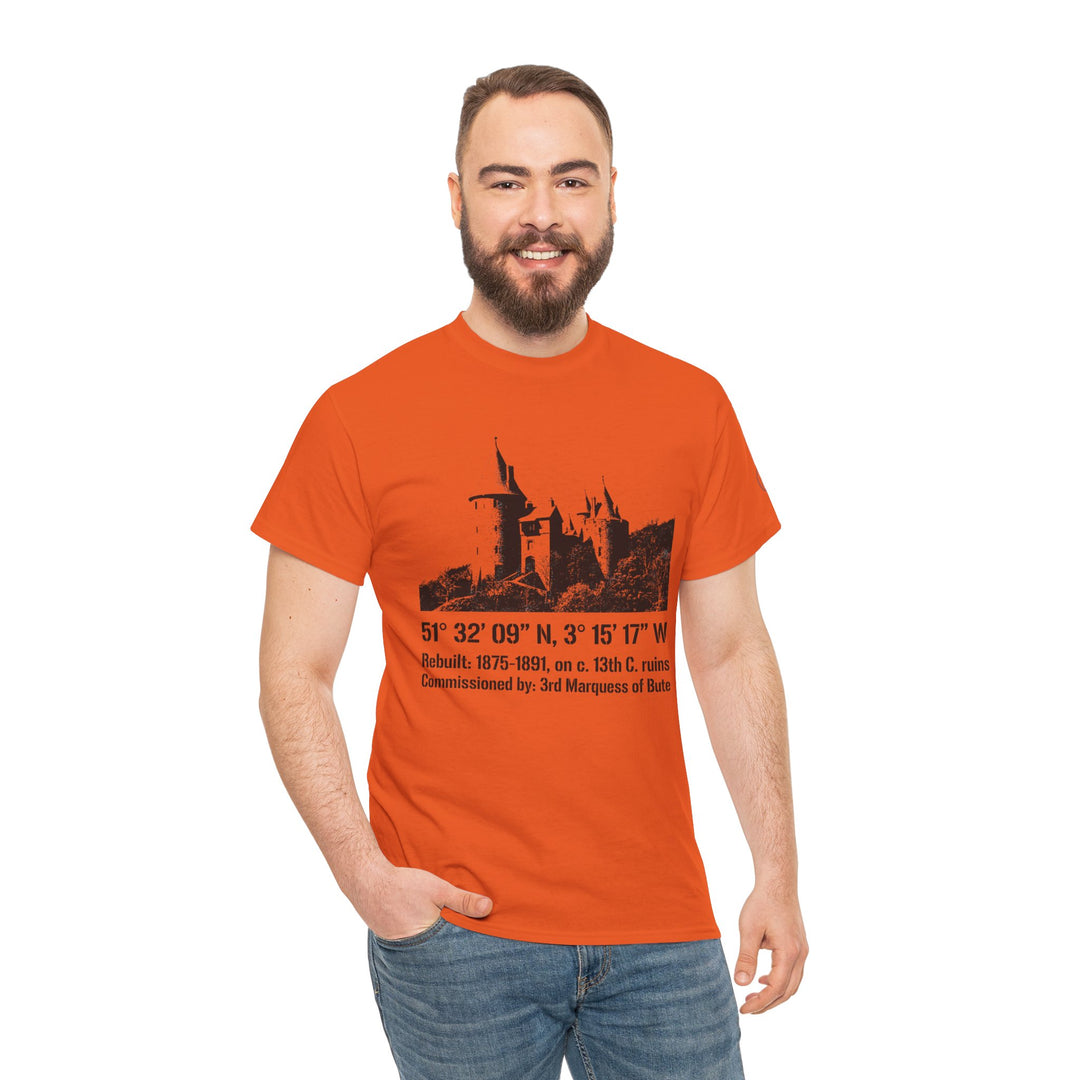 Orange t-shirt with castle illustration by S&amp;W Gallus, paired with jeans, shown on a smiling man.