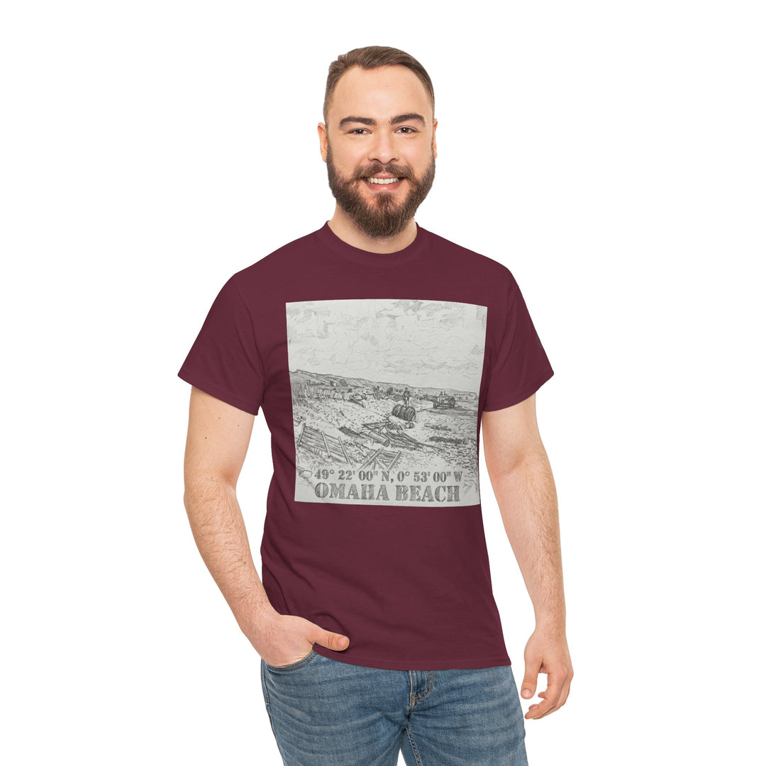 Burgundy graphic t-shirt from Veteran Owned featuring an Omaha Beach illustration, over blue jeans on a smiling man.